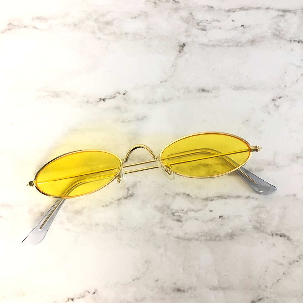 miniature yellow sunglasses